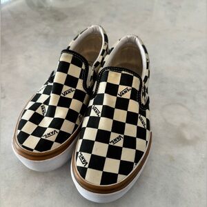 Vans black and white checkered platform slip-ons
